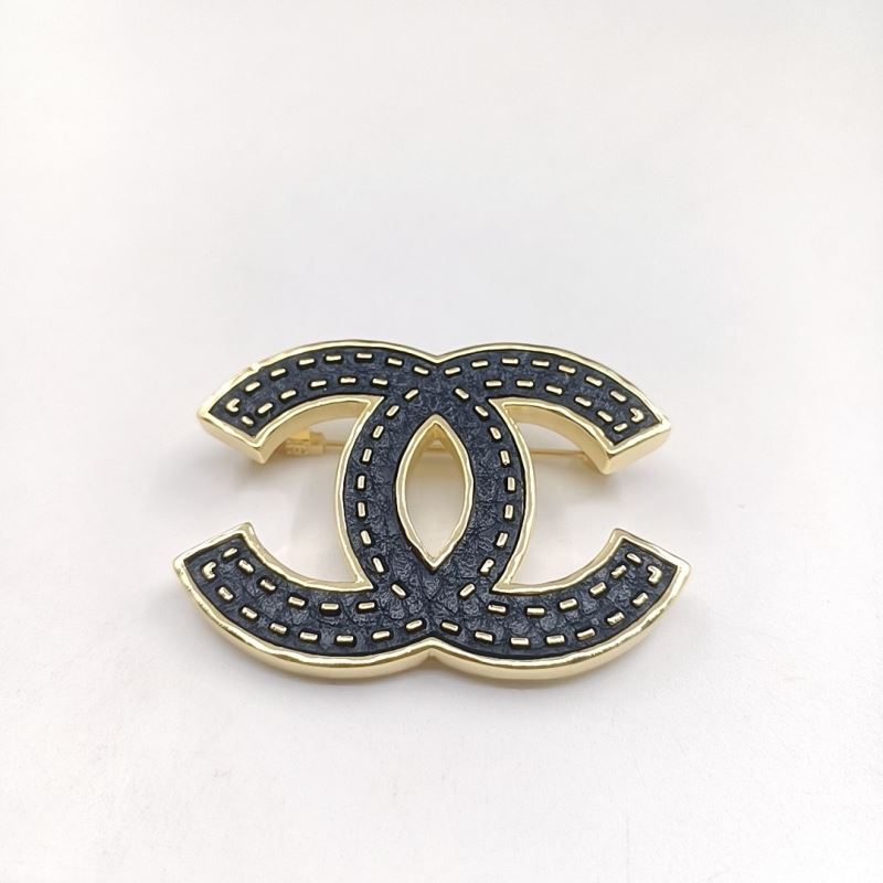 Ch*el brooches